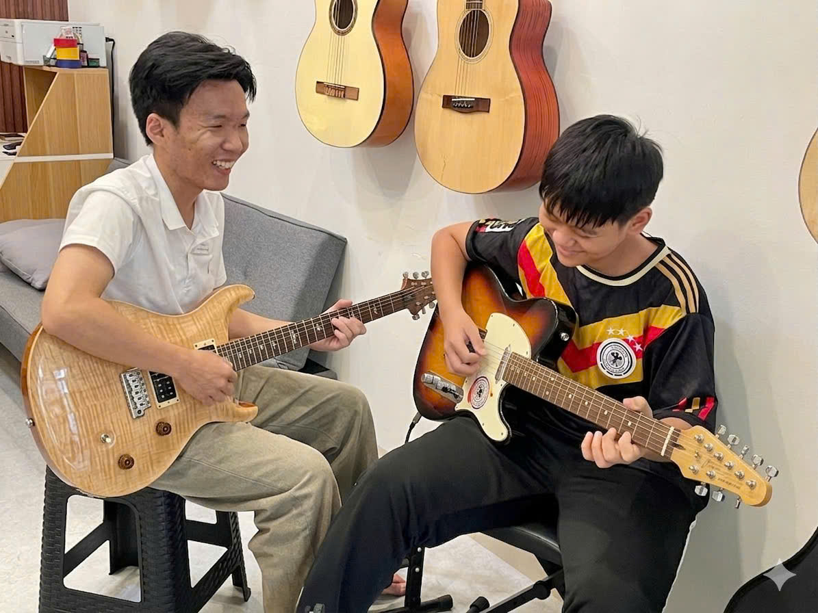 khoa-hoc-guitar-dien-q7
